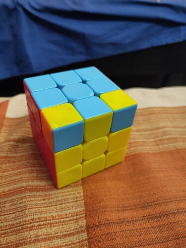 Stuck in rubiks cube. Only last two corner pieces are interchanged