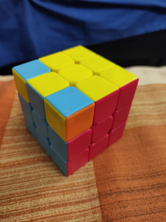 Stuck in rubiks cube. Only last two corner pieces are interchanged
